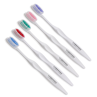 Concept Curve Bristles - Adult size toothbrush with soft bristles. White bodied toothbrush with inner bristles
