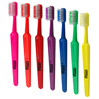 Concept Toothbrush - Adult size toothbrush with soft bristles.
