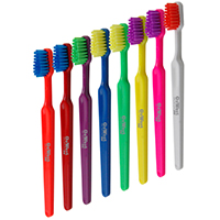 Junior Hot Tropics Toothbrush - Middle aged child size toothbrush with soft bristles. Contrasting body and bristle.