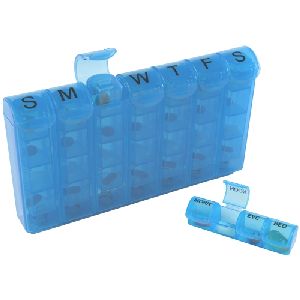 28 Compartment Med Minder - This medicine organizer holds 7 removable 4-compartment pill strips